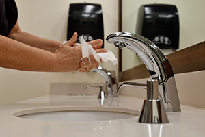 Drying hands with a paper towel